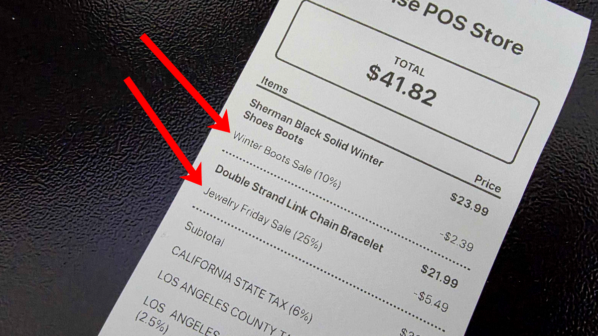 Receipt with total amount of $41.82 on a black textured surface