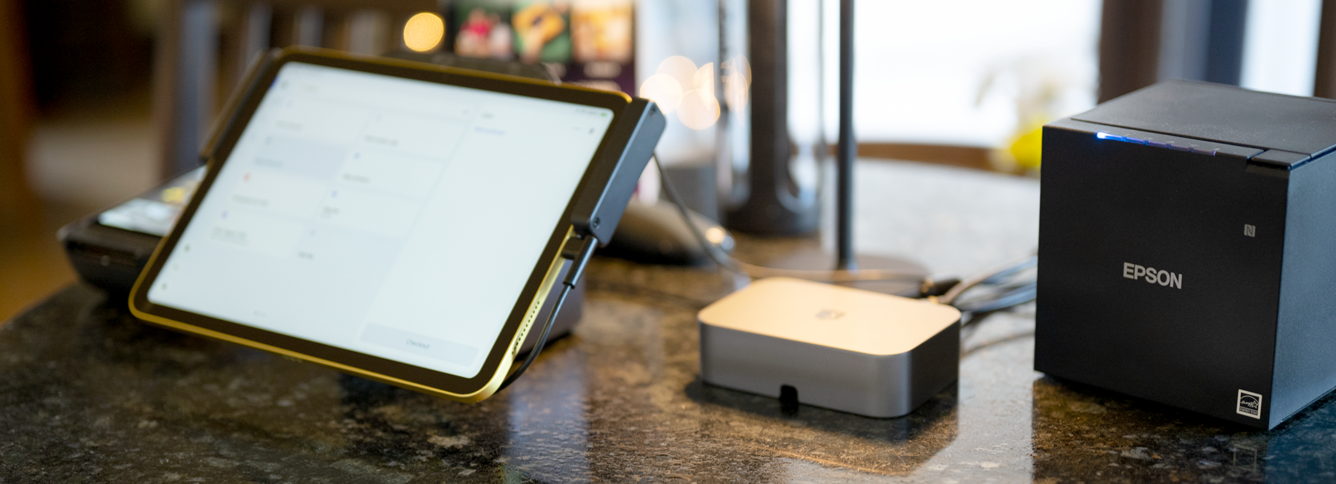 Shopify POS hub in a retail store with a wired connection